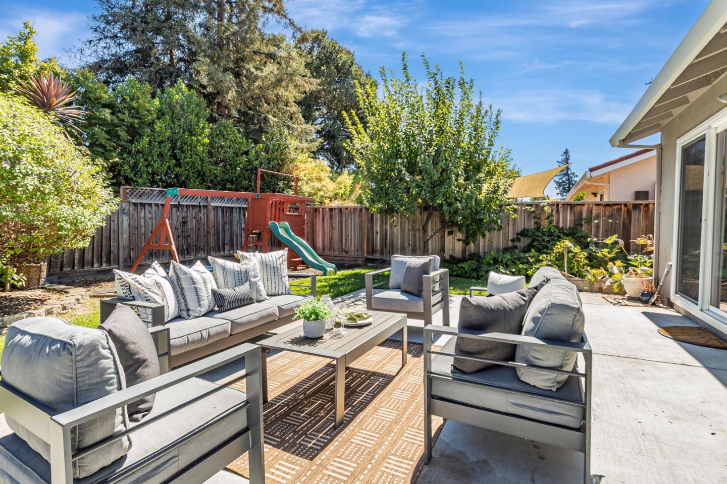 824 Buchser Way San Jose, CA 95125 - Photo 41 of 50 a view of backyard with seating space and trees