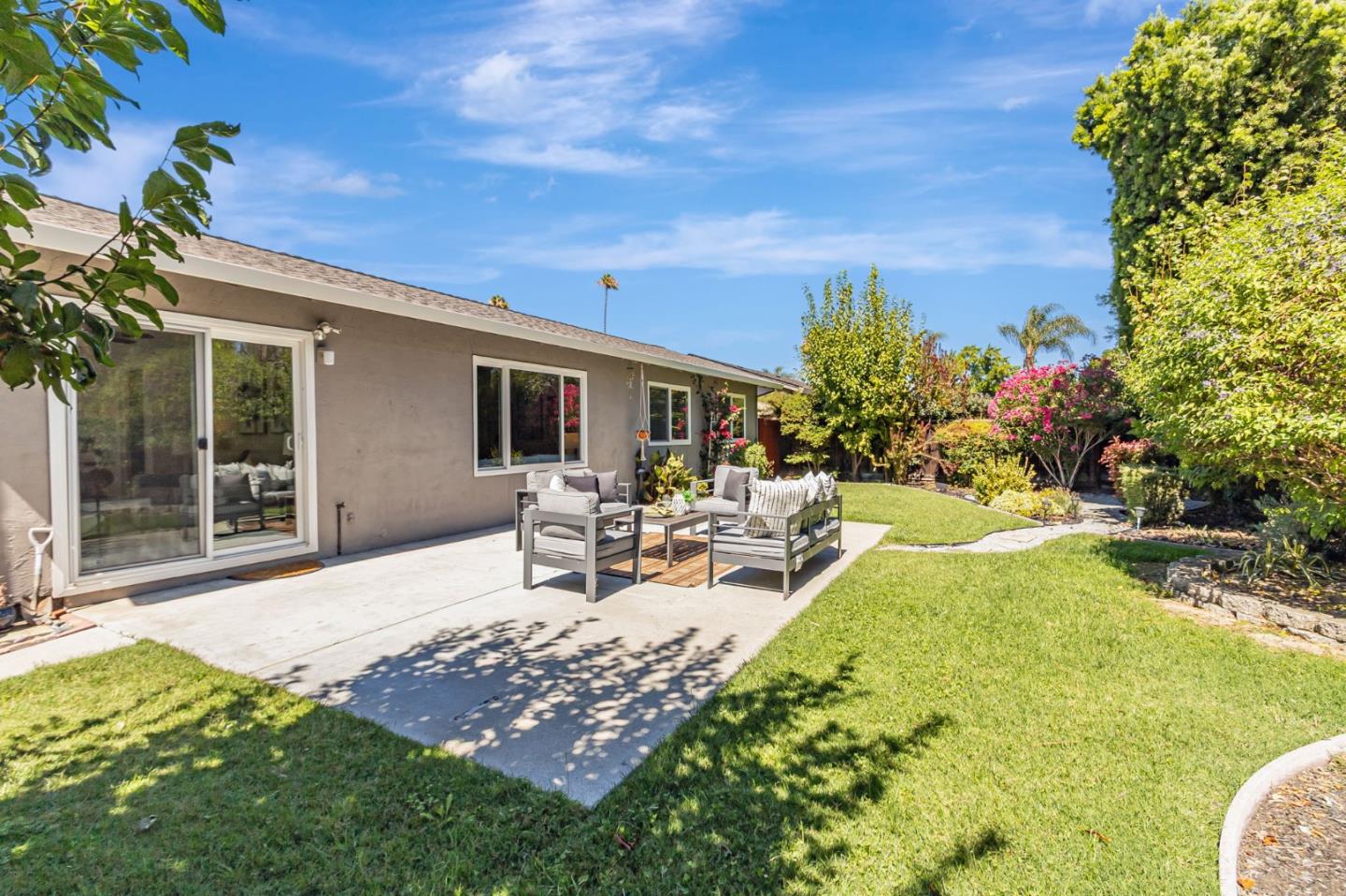 824 Buchser Way San Jose, CA 95125 - Photo 45 of 50 a view of a backyard with table and chairs and potted plants