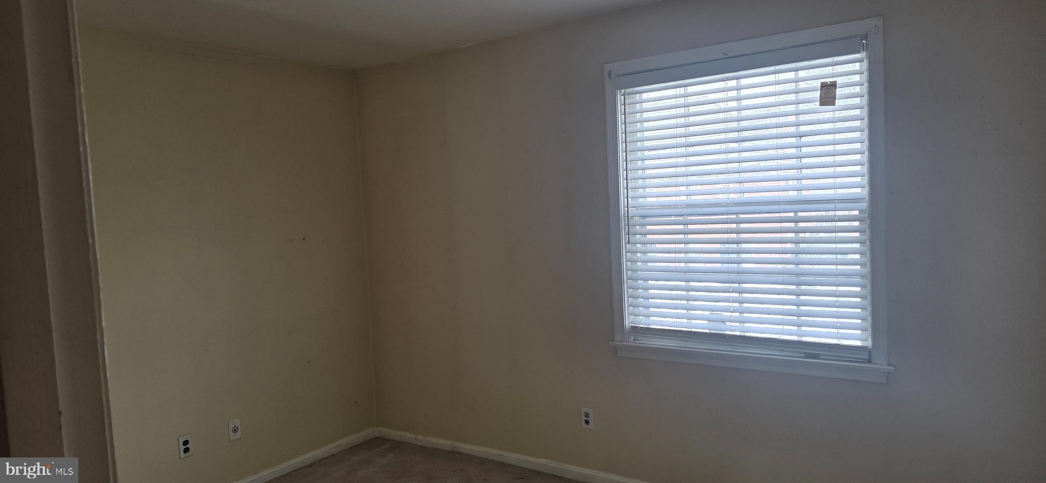 2107 Fort Davis Street Southeast, Unit 202 Washington, DC 20020 - Photo 6 of 7 a small space with a window