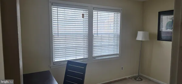 a view of a room that has a window in it