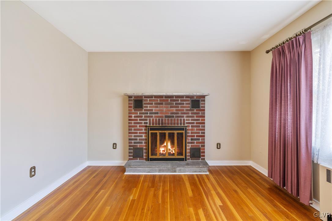 1523 Spring Street Bethlehem, PA 18018 - Photo 26 of 47 DINING ROOM - WOOD BURNING BRICK FIREPLACE