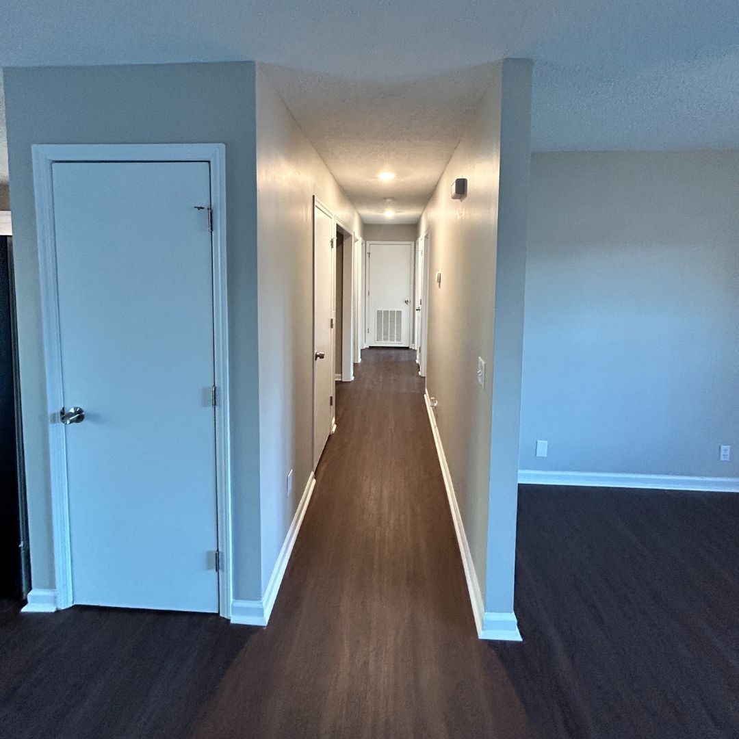 646 Butler Road Portland, TN 37148 - Photo 5 of 11 a view of a hallway with wooden floor