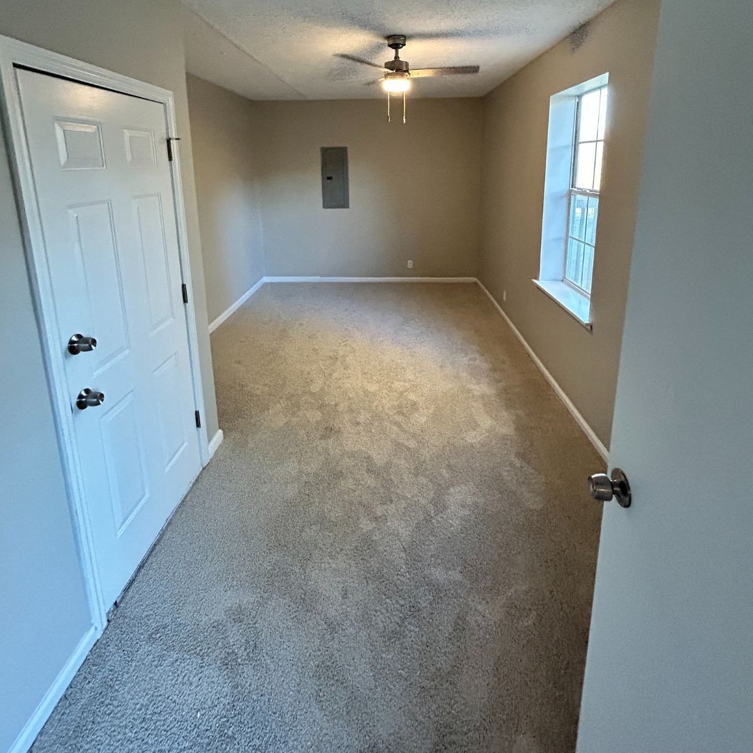 646 Butler Road Portland, TN 37148 - Photo 9 of 11 an empty room with windows and closet