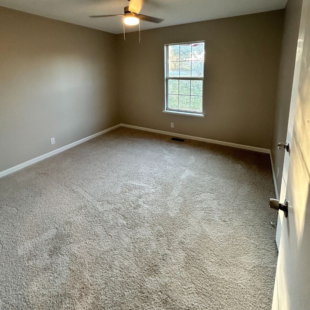 646 Butler Road Portland, TN 37148 - Photo 10 of 11 an empty room with a window
