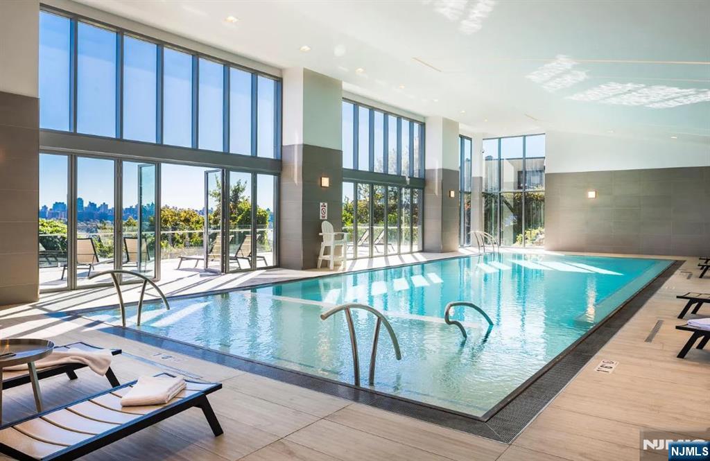 320 Adolphus Avenue, Unit 1013 Cliffside Park, NJ 07010 - Photo 12 of 18 a living room with window