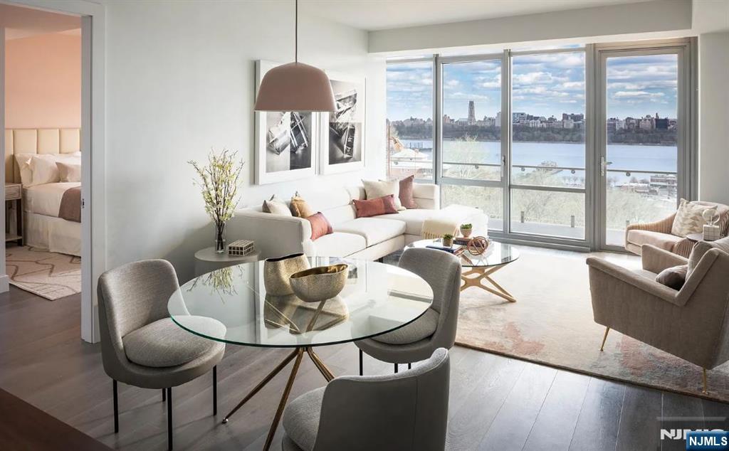 320 Adolphus Avenue, Unit 1013 Cliffside Park, NJ 07010 - Photo 2 of 18 a living room with furniture and a large window