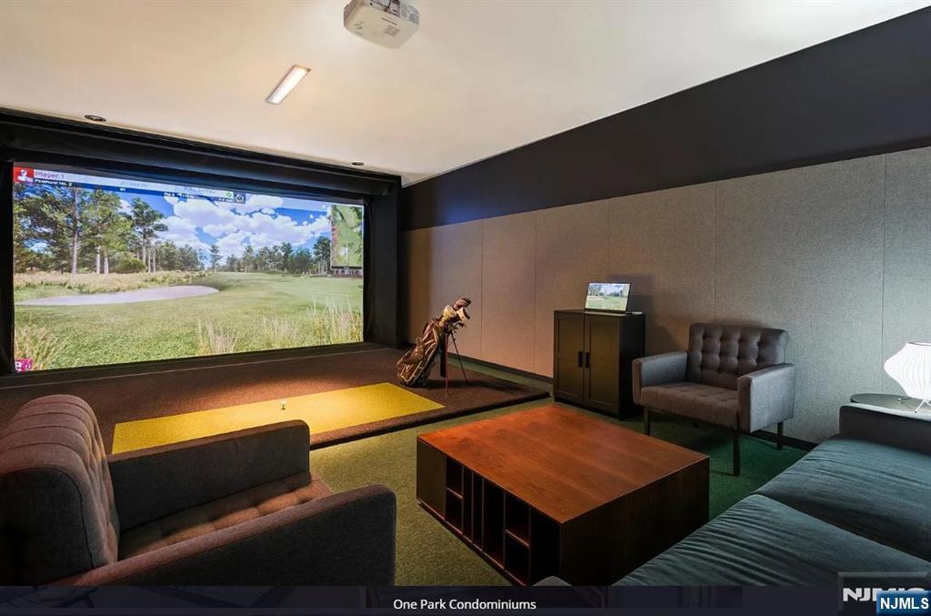 320 Adolphus Avenue, Unit 1013 Cliffside Park, NJ 07010 - Photo 8 of 18 a room with furniture and screen