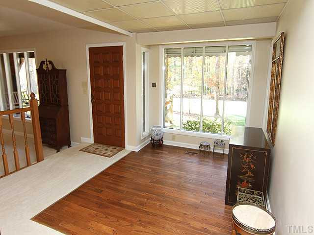 4105 Fiesta Road Durham, NC 27703 - Photo 9 of 25 a view of room with window and wooden floor