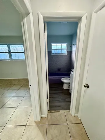a bathroom with a sink and toilet