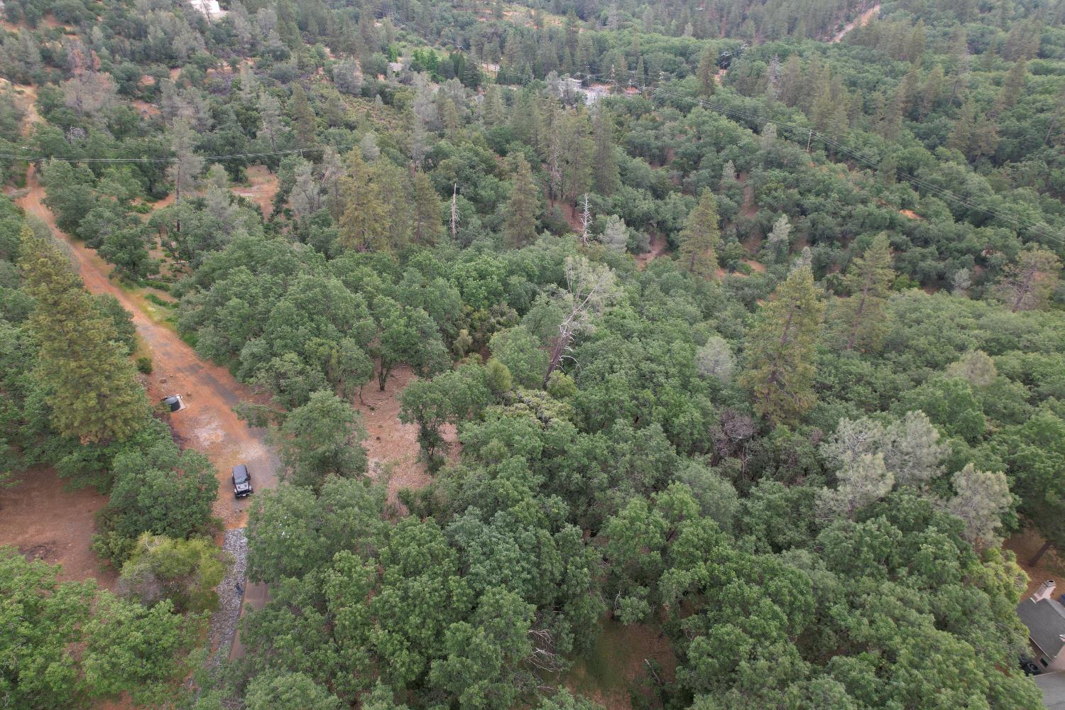 0 Bridle Path Road Colfax, CA 95713 - Photo 4 of 14 an aerial view of residential house with outdoor space and trees all around