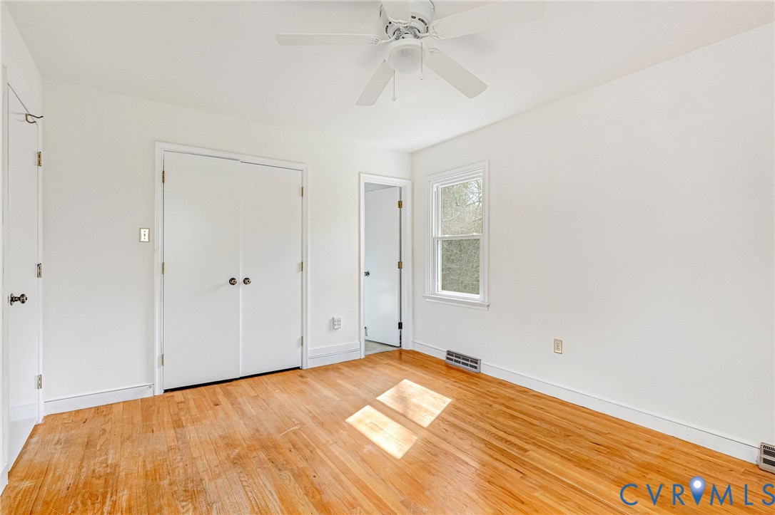 9107 Mossy Brook Road Mechanicsville, VA 23116 - Photo 15 of 30 Unfurnished bedroom with light wood-type flooring,