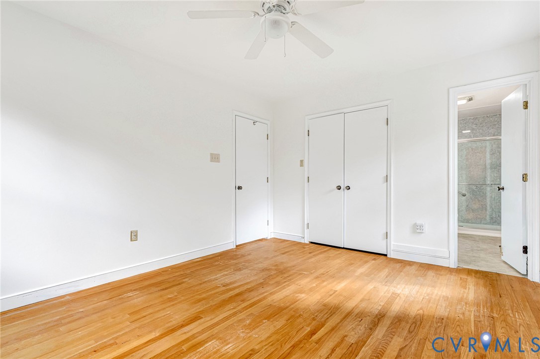 9107 Mossy Brook Road Mechanicsville, VA 23116 - Photo 16 of 30 Unfurnished bedroom with light wood-style flooring