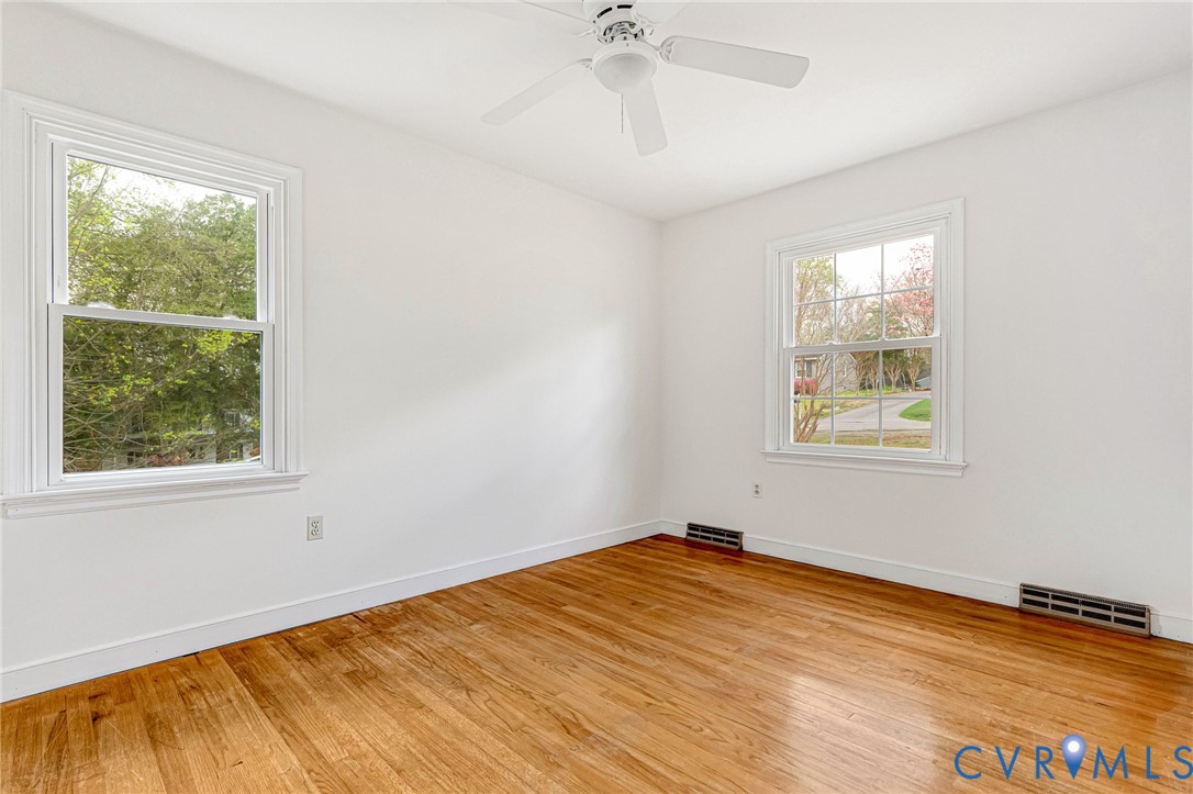9107 Mossy Brook Road Mechanicsville, VA 23116 - Photo 19 of 30 Spare room featuring light wood-type flooring and