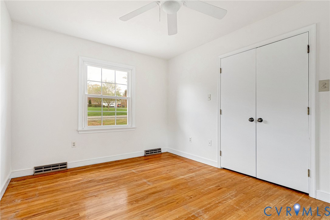 9107 Mossy Brook Road Mechanicsville, VA 23116 - Photo 21 of 30 Unfurnished bedroom with light wood-style flooring