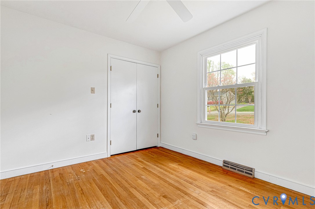 9107 Mossy Brook Road Mechanicsville, VA 23116 - Photo 23 of 30 Unfurnished bedroom with light wood finished floor