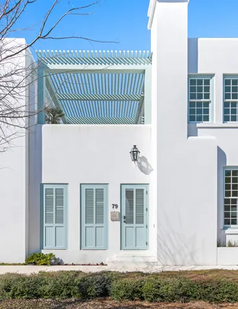 a front view of a house with garage
