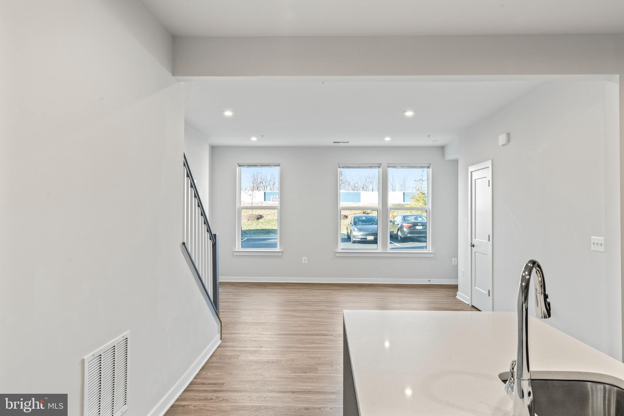 20320 Newfoundland Square Ashburn, VA 20147 - Photo 6 of 53 Open living/dining/kitchen