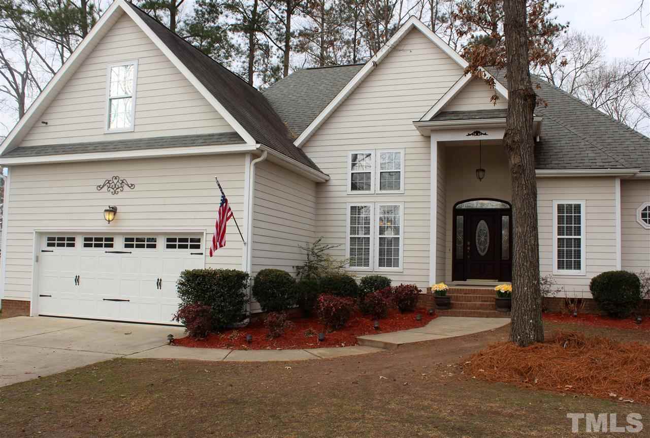 6904 Field Hill Road Raleigh, NC 27603 - Photo 3 of 25 a front view of a house with garden