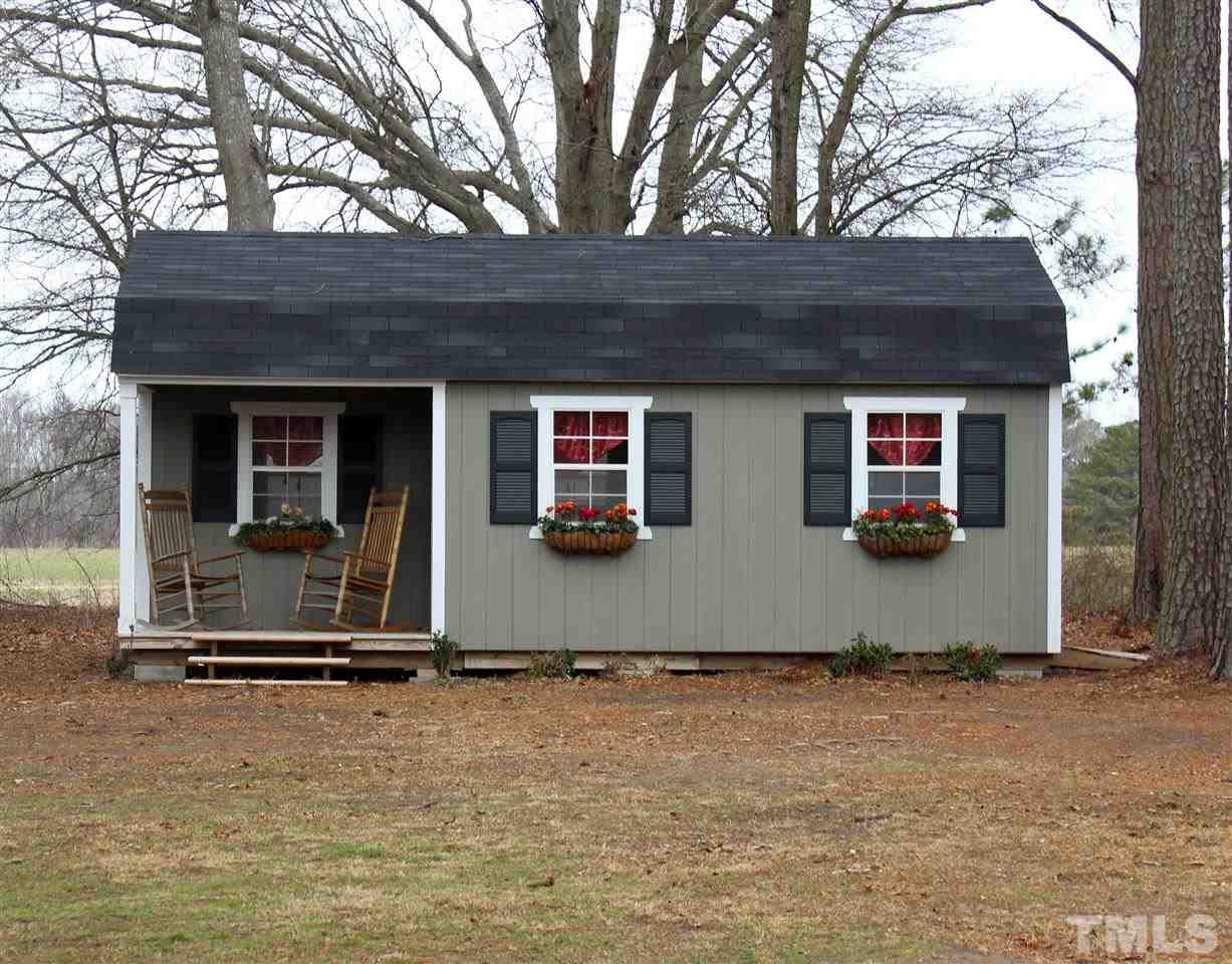 6904 Field Hill Road Raleigh, NC 27603 - Photo 25 of 25 a couple of table and chairs in front of house