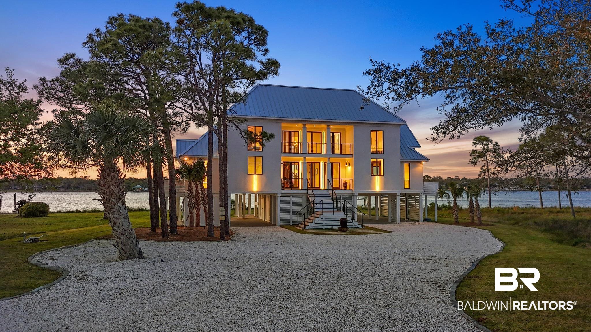 33349 River Road Orange Beach, AL 36561 - Photo 59 of 61 Waterfront residence with a metal roof and elevated foundation