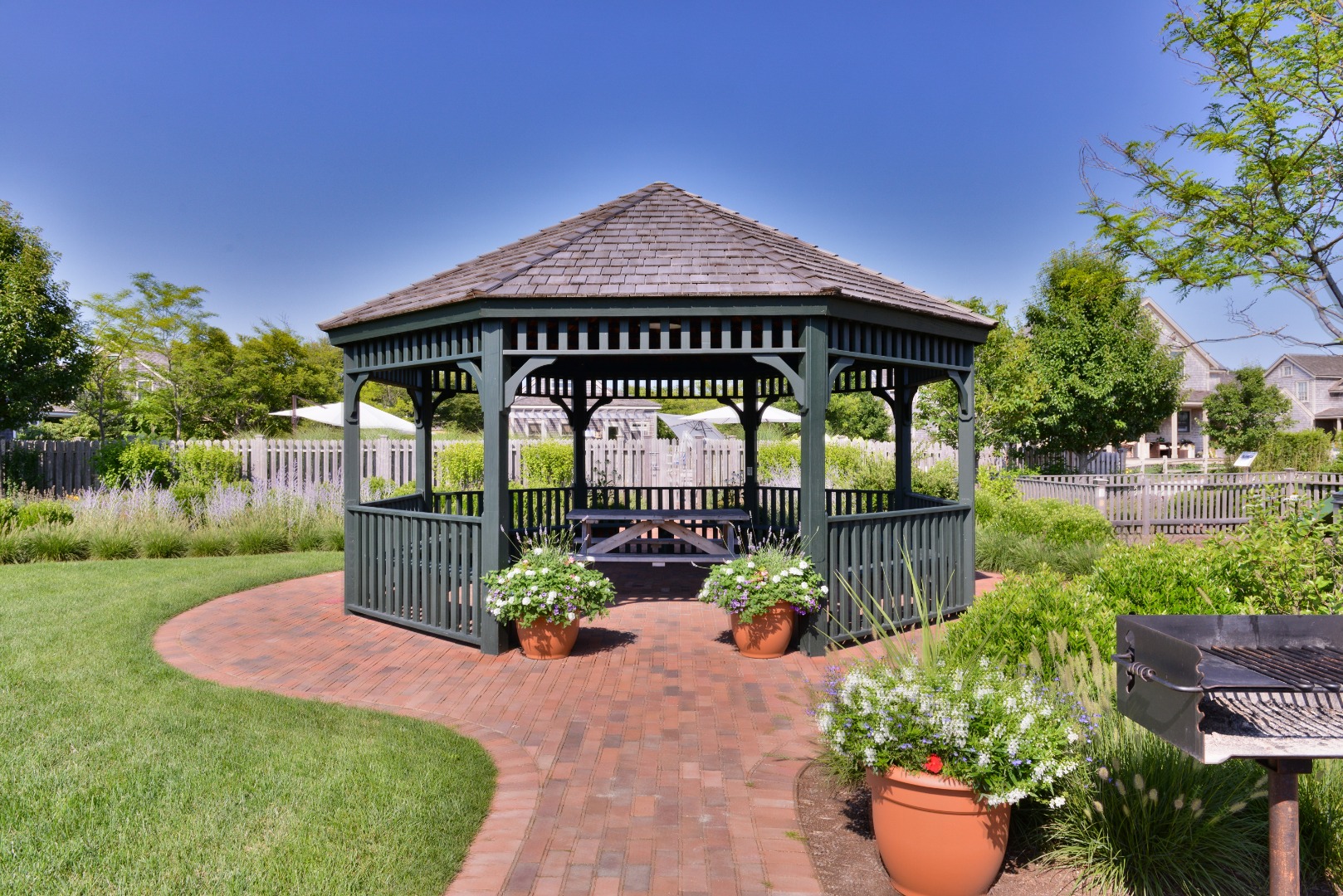3 Wood Lily Road Nantucket, MA 02554 - Photo 51 of 55 a front view of a house with garden