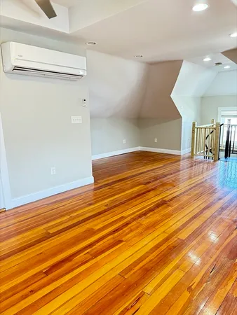 a view of room and wooden floor