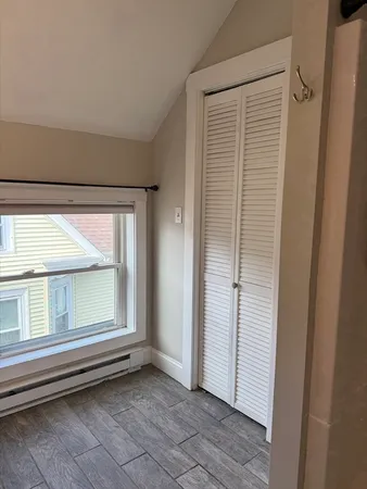 an empty room with window