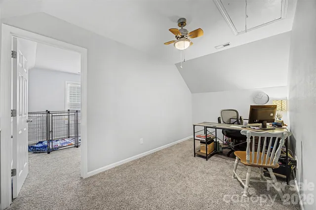 a bedroom with a bed and a cabinets
