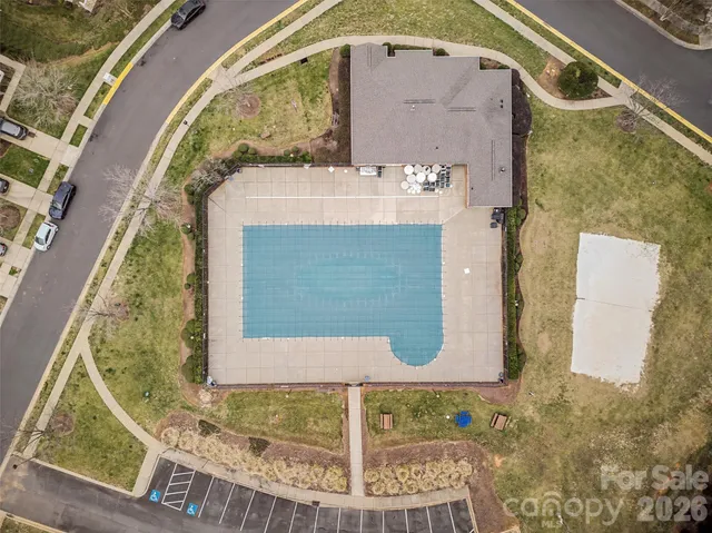 a view of swimming pool with an ocean view