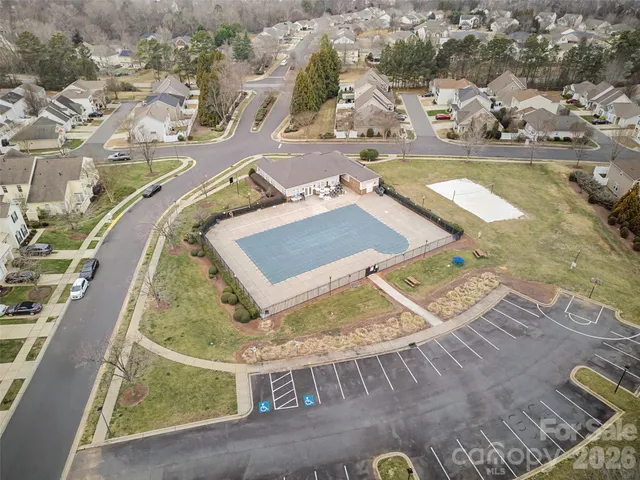 a view of a dry yard with an ocean