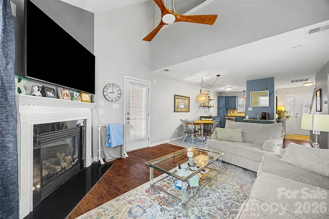 a kitchen with stainless steel appliances granite countertop a refrigerator sink and microwave