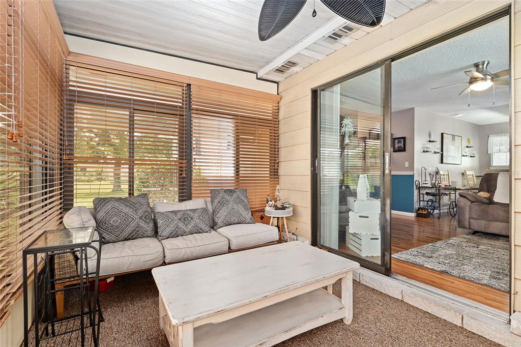 10182 Southwest 88th Court Ocala, FL 34481 - Photo 26 of 31 a living room with furniture and a large window