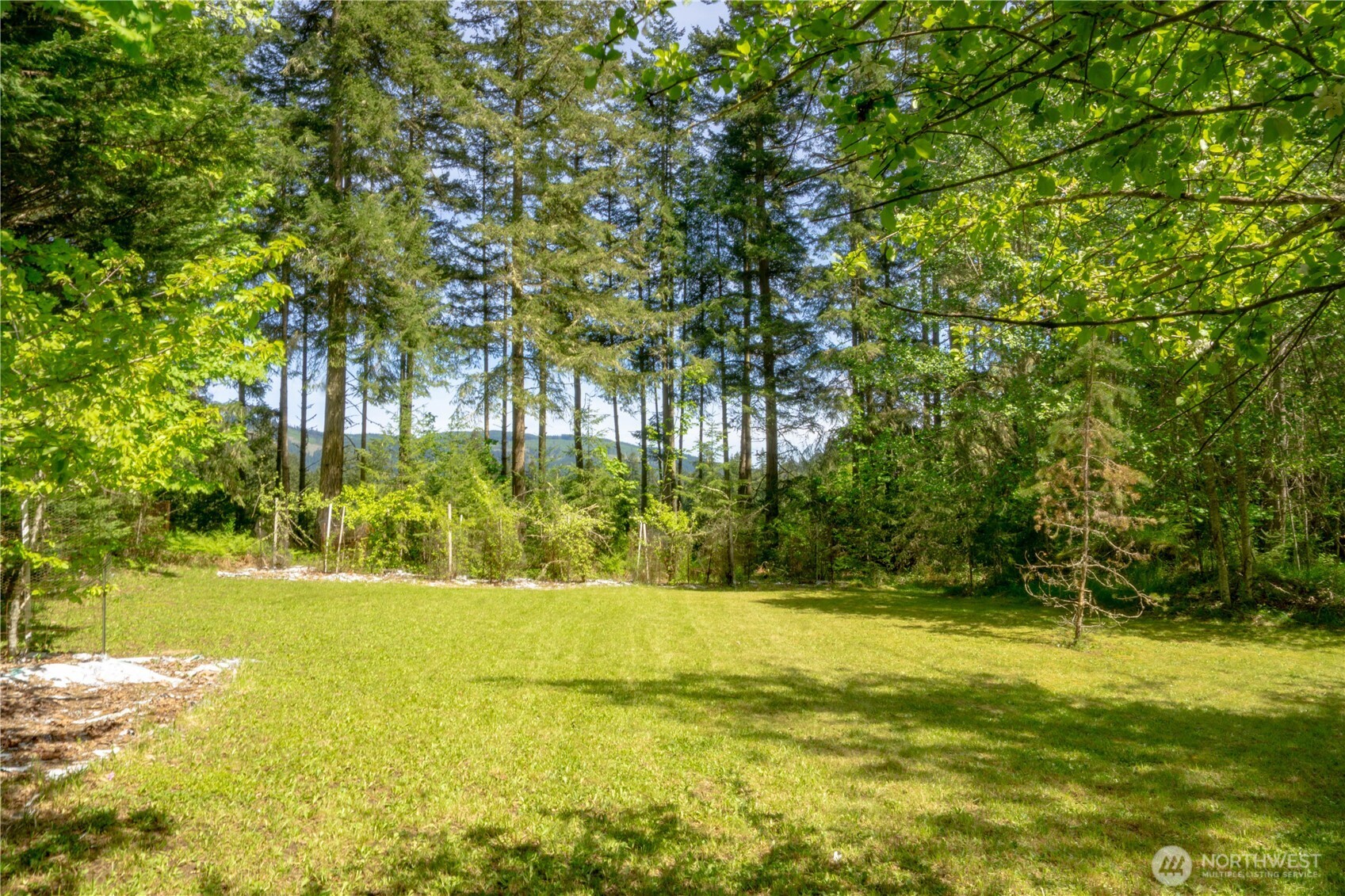 89 Slab Camp Road Sequim, WA 98382 - Photo 32 of 40 a view of swimming pool with an outdoor space and seating area