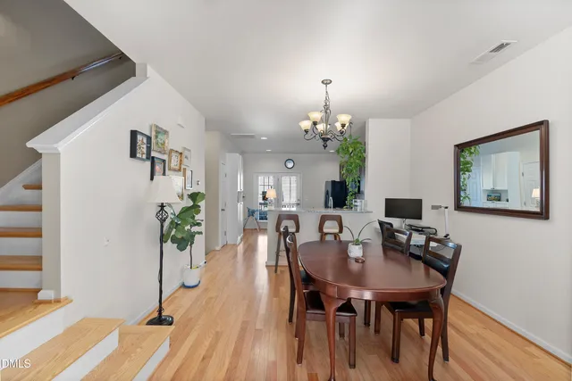 a picture of a bench in front of a wall