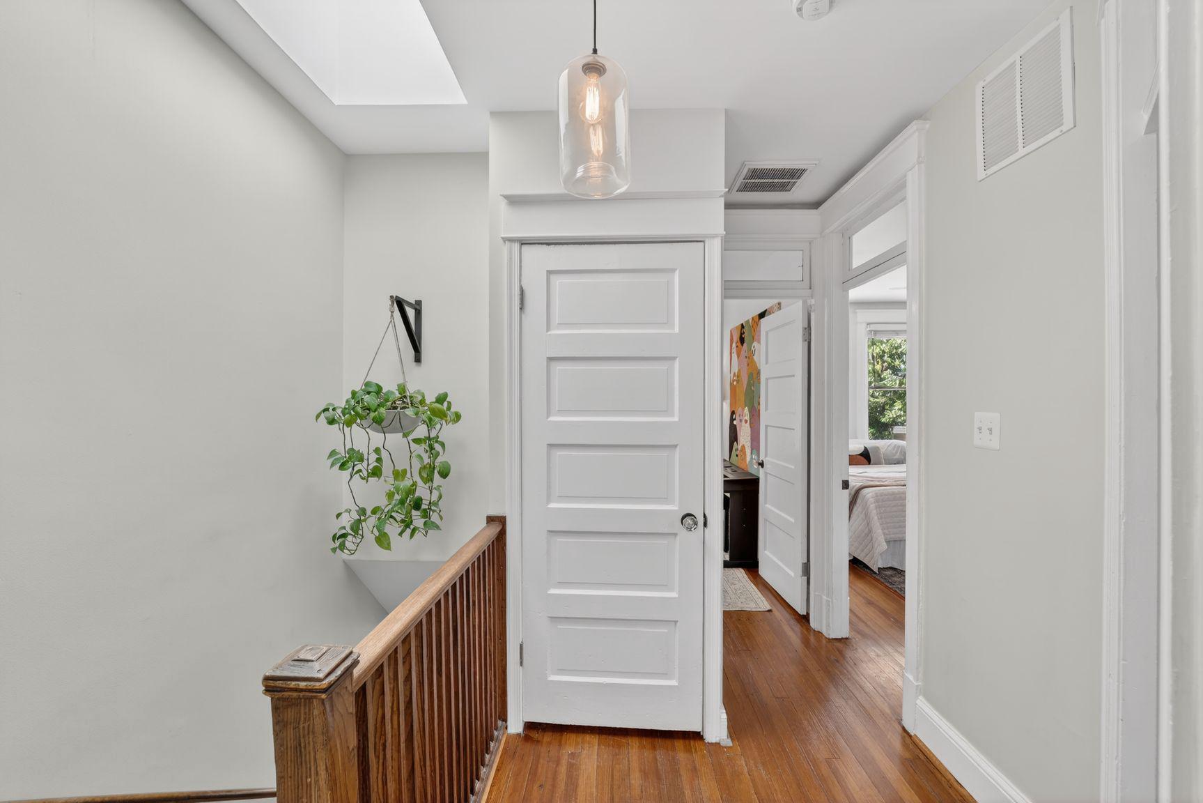 309 Webster Street Northwest Washington, DC 20011 - Photo 21 of 49 Bright hallway /1920's details. Check the transoms