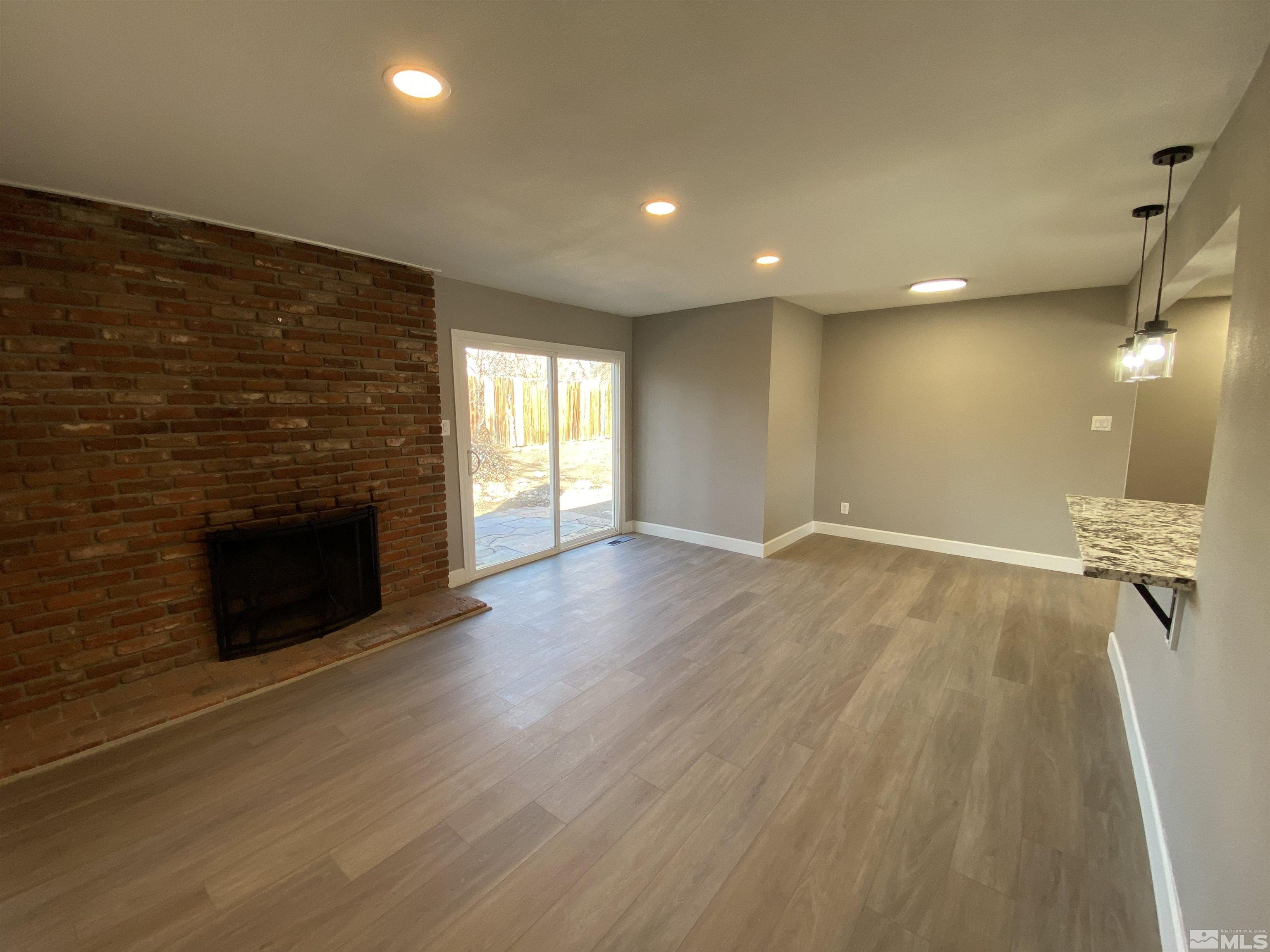 4035 Jasper Lane Reno, NV 89509 - Photo 8 of 16 a view of a livingroom with a fireplace