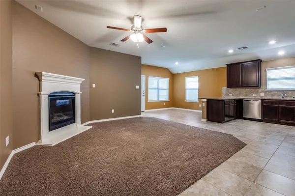 a view of a livingroom with a kitchen