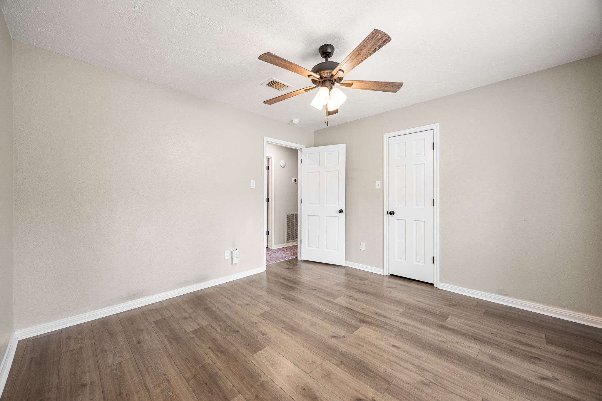 5527 Alamosa Lane Spring, TX 77379 - Photo 23 of 40 wooden floor in an empty room