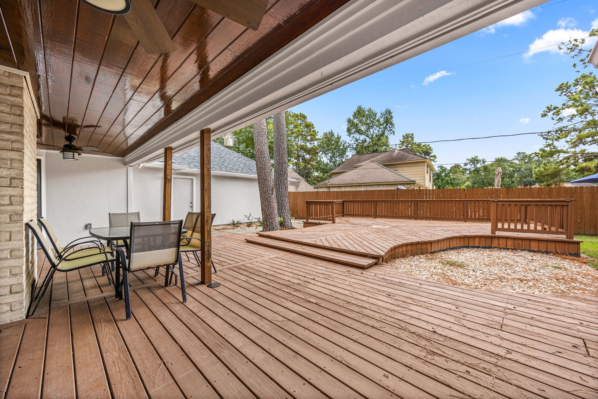 5527 Alamosa Lane Spring, TX 77379 - Photo 24 of 40 a view of a chairs and table on the wooden floor