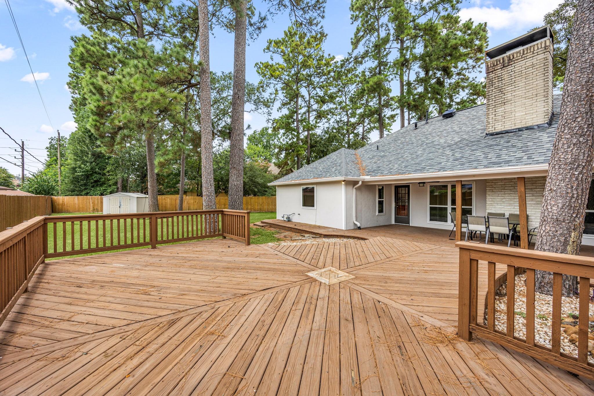 5527 Alamosa Lane Spring, TX 77379 - Photo 27 of 40 a view of a house with wooden deck