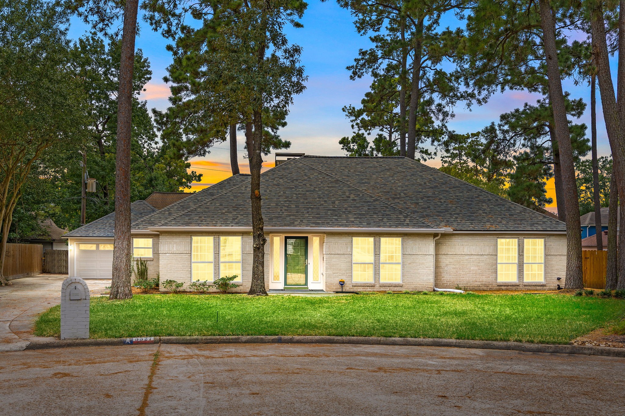 5527 Alamosa Lane Spring, TX 77379 - Photo 30 of 40 a front view of a house with a garden