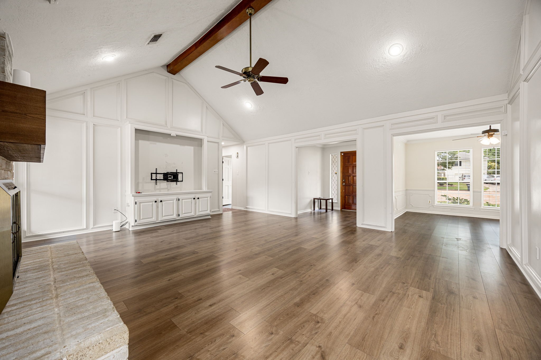 5527 Alamosa Lane Spring, TX 77379 - Photo 3 of 40 a view of an empty room with wooden floor and a window