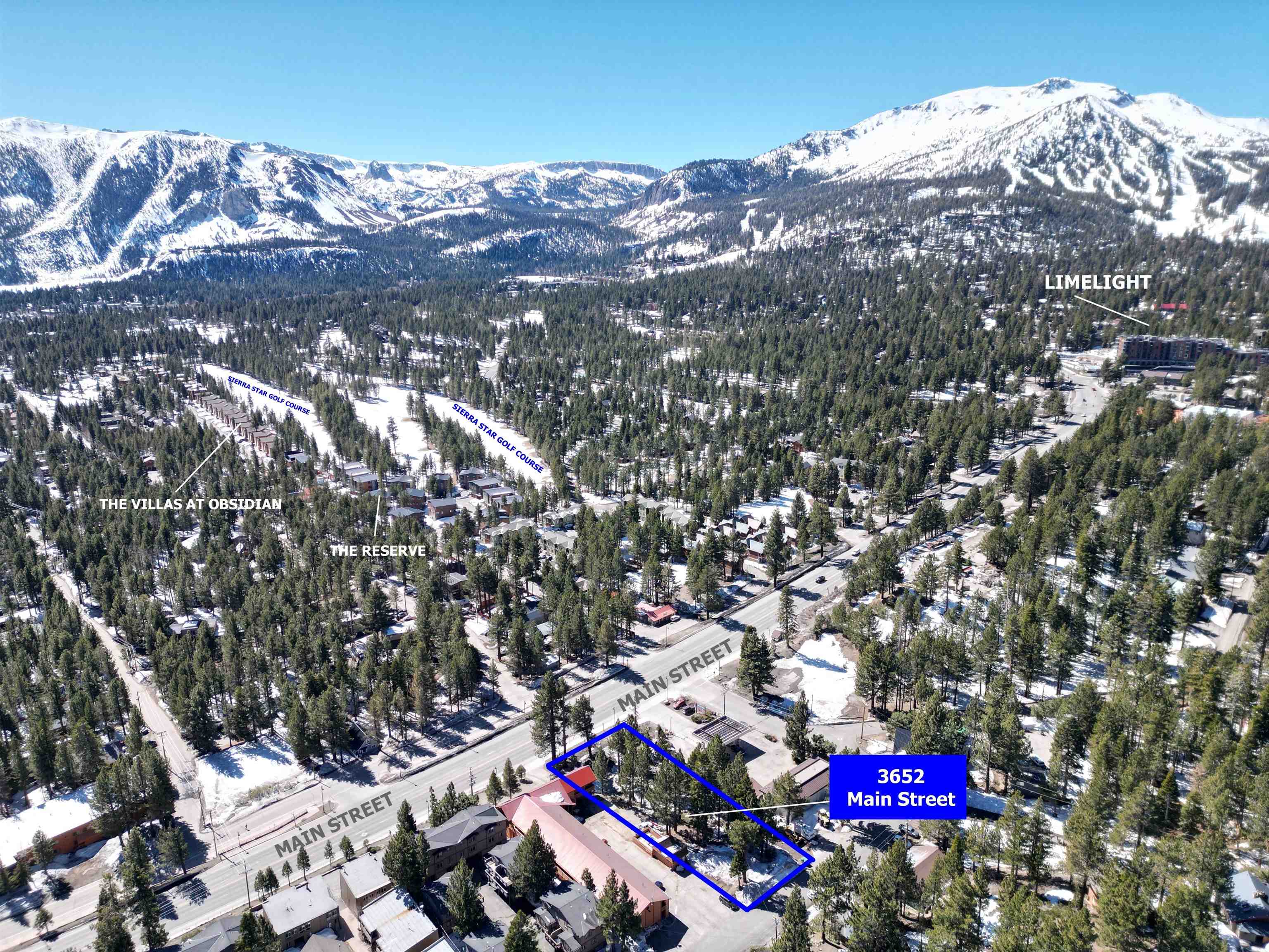 3652 Main Street Mammoth Lakes, CA 93546 - Photo 3 of 12 Snowy aerial view with a mountain view and property parcel outlined