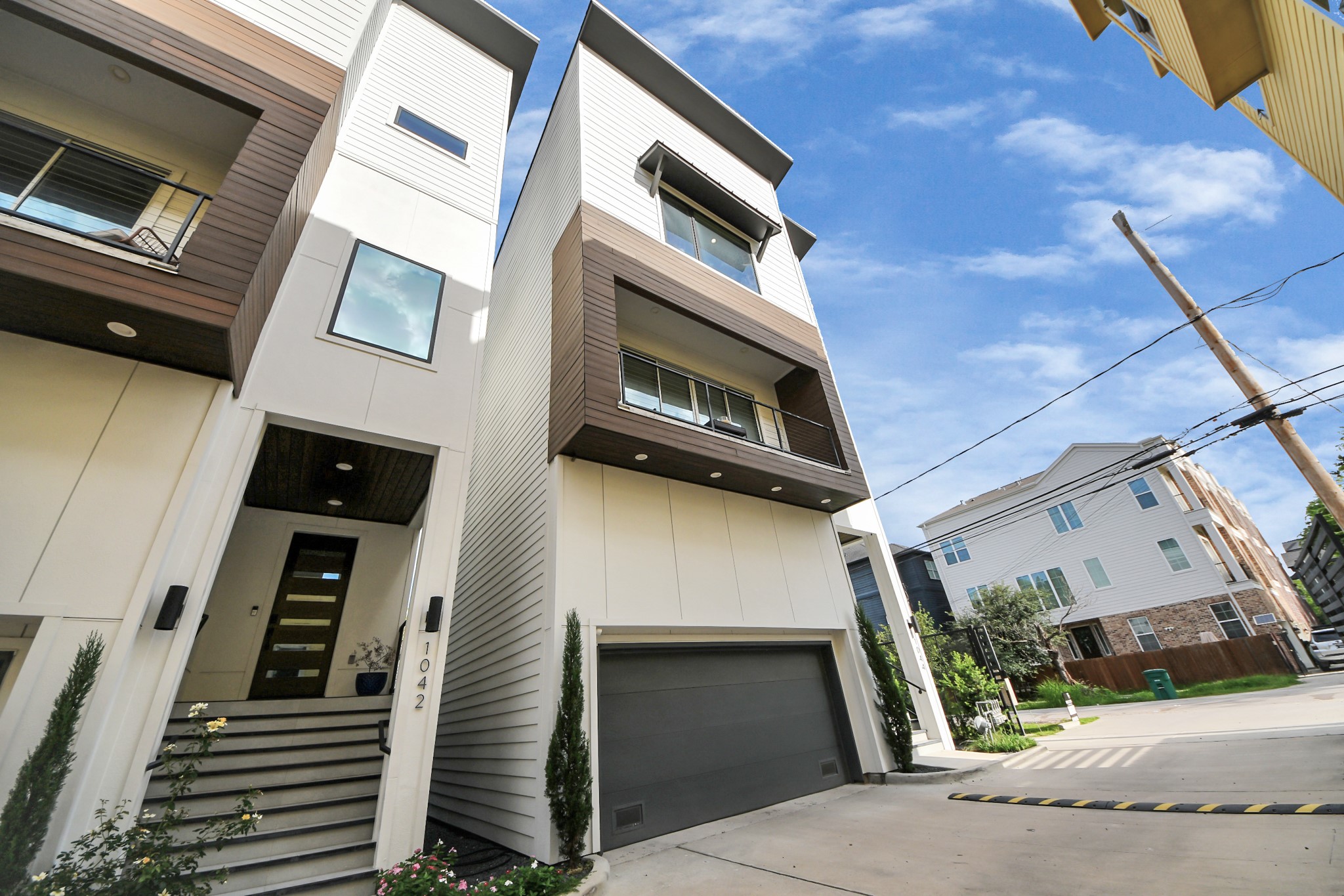 1044 West 17th Street Houston, TX 77008 - Photo 46 of 48 a view of a garage with an outdoor space