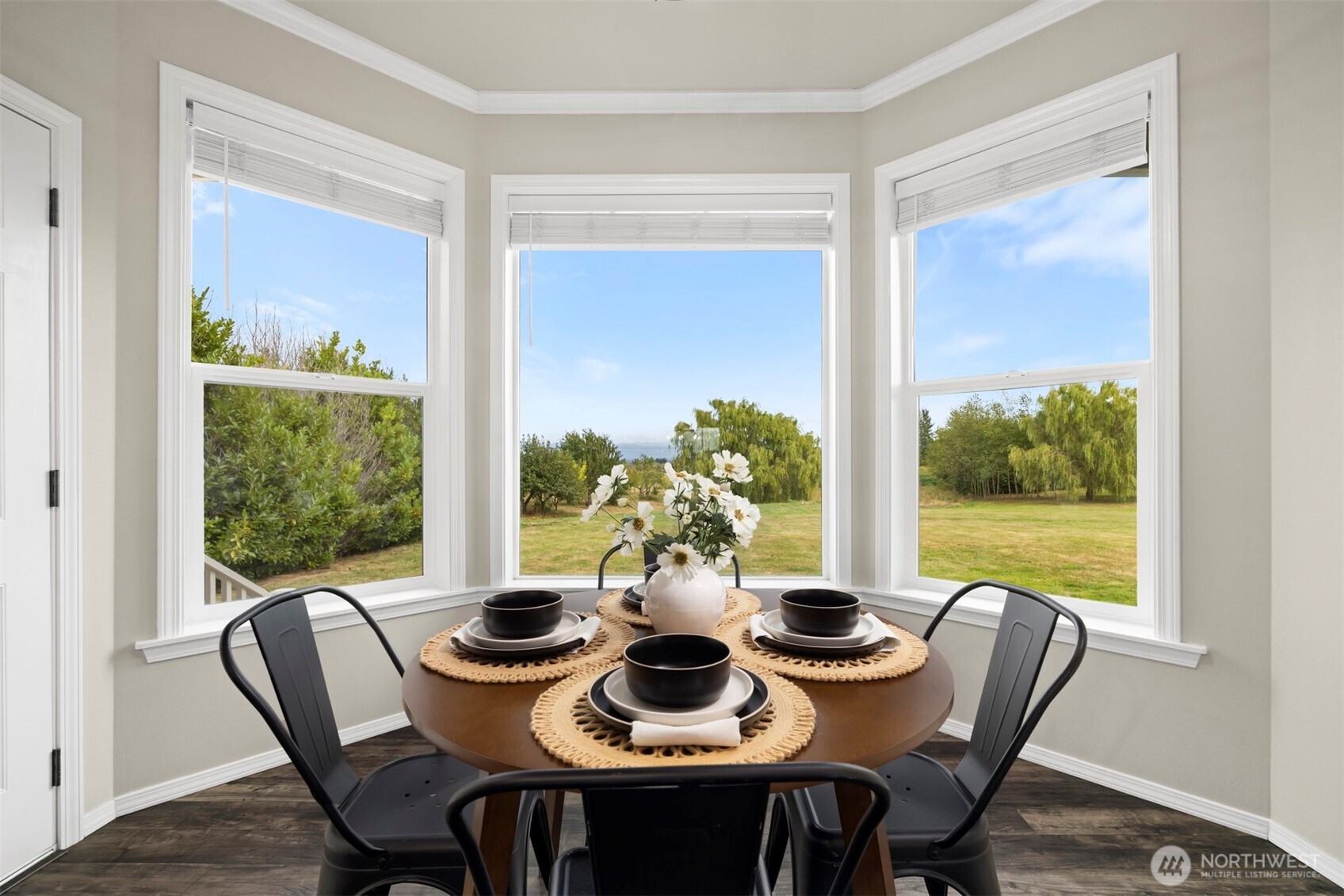 6729 Hawk Ridge Drive Ferndale, WA 98248 - Photo 13 of 40 a view of a dining room with furniture window and outside view