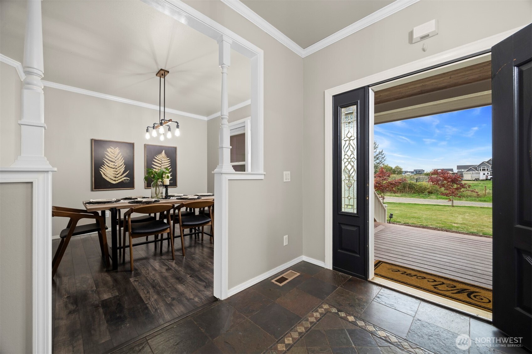 6729 Hawk Ridge Drive Ferndale, WA 98248 - Photo 4 of 40 a view of a dining room with furniture window and wooden floor