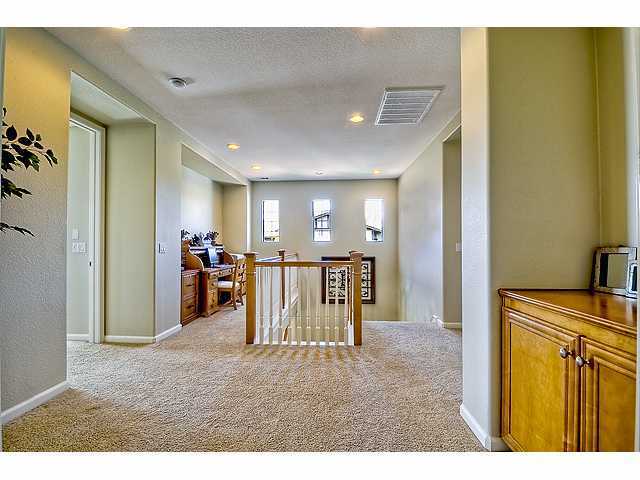 2390 Lapis Road Carlsbad, CA 92009 - Photo 14 of 25 The upstairs area is very open and features as niche perfect for small home office, homework area or library