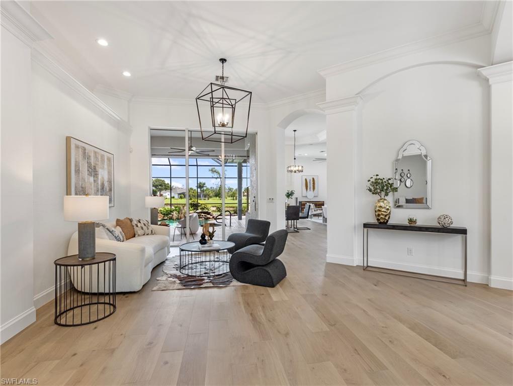 20451 Wildcat Run Drive Estero, FL 33928 - Photo 3 of 49 a living room with furniture