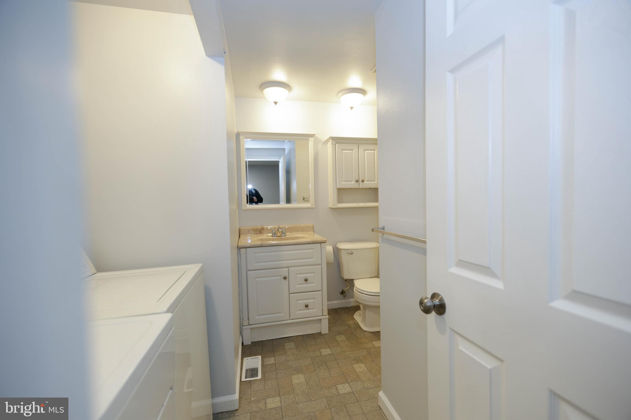 742 Summit Chase Drive Reading, PA 19611 - Photo 11 of 20 a bathroom with a sink toilet vanity and tub