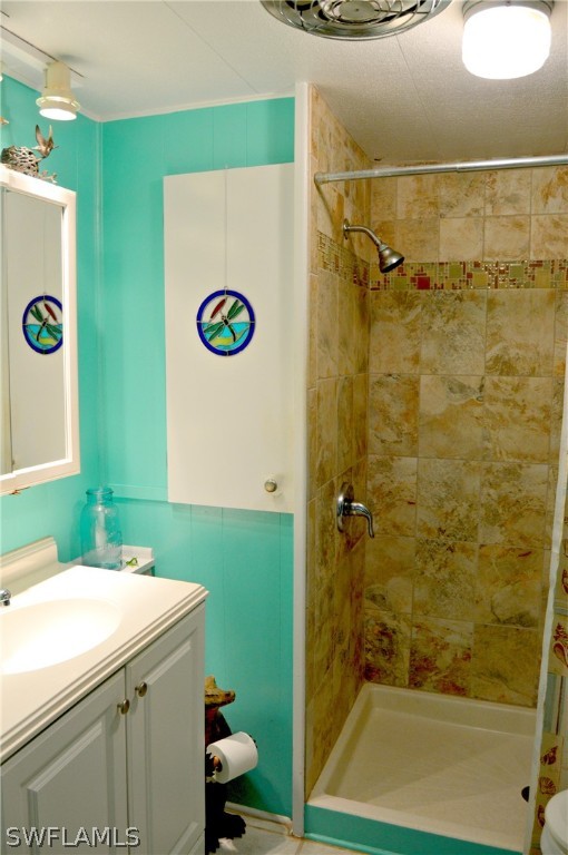 2591 Cay Cove Matlacha, FL 33993 - Photo 17 of 20 a bathroom with a sink and a mirror